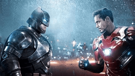A dramatic face-off between two iconic superheroes, Batman in a dark suit and Iron Man in a red suit, set against a rainy urban backdrop.
